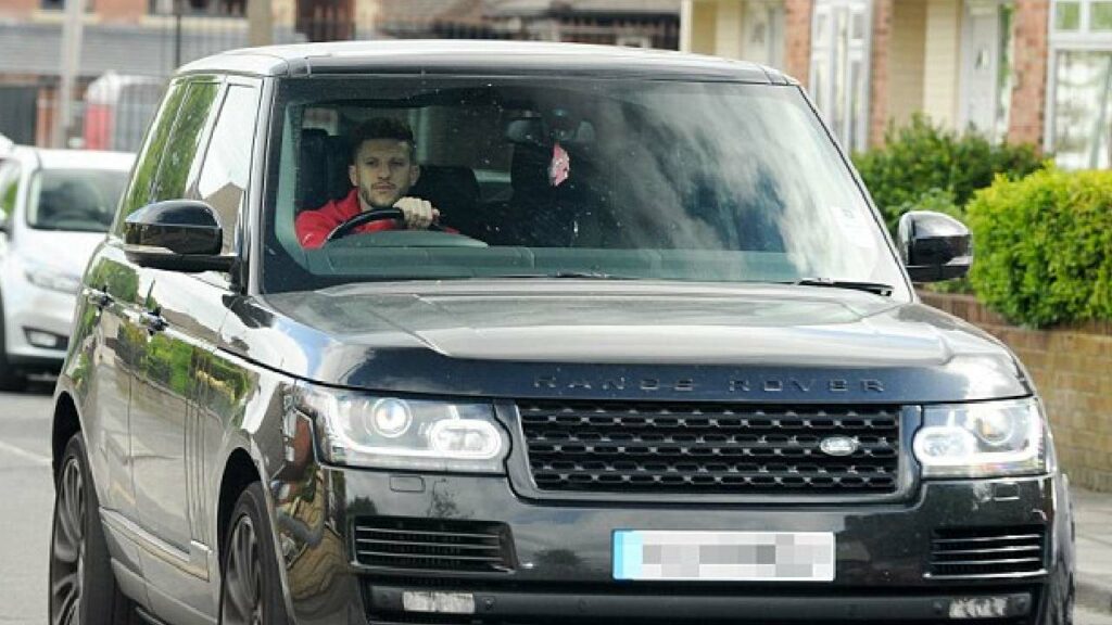 Adam Lallana with Range Rover Vogue