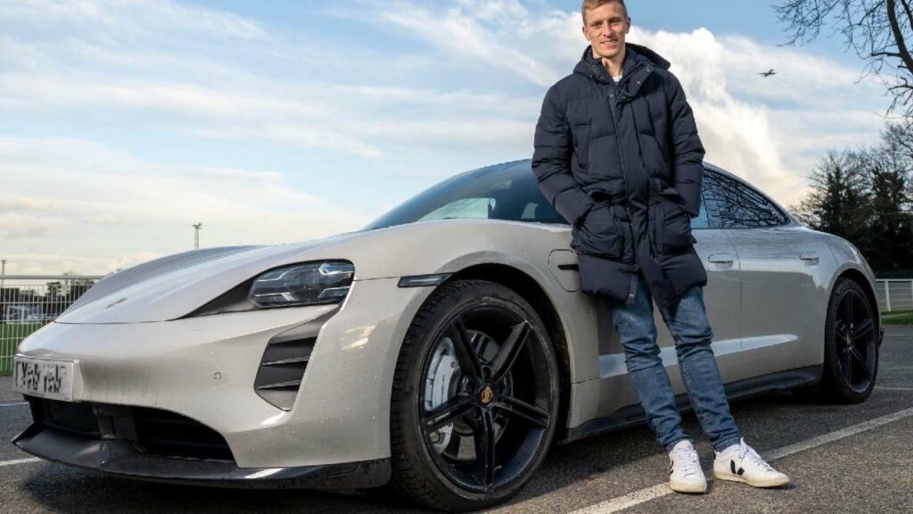Ben Mee with Porsche Taycan