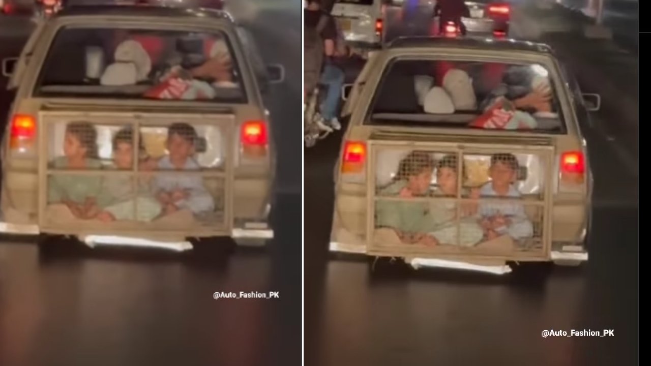 Children in Cage on Back of Car in Pakistan