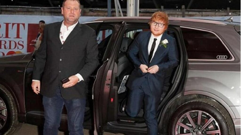 Ed Sheeran with his Audi Q7