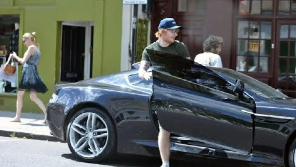 Ed Sheeran with his Ferrari