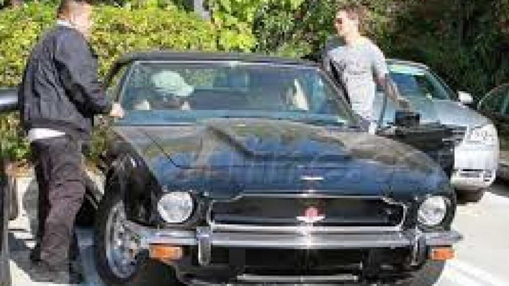 Halle Berry with Aston Martin V8 Volante