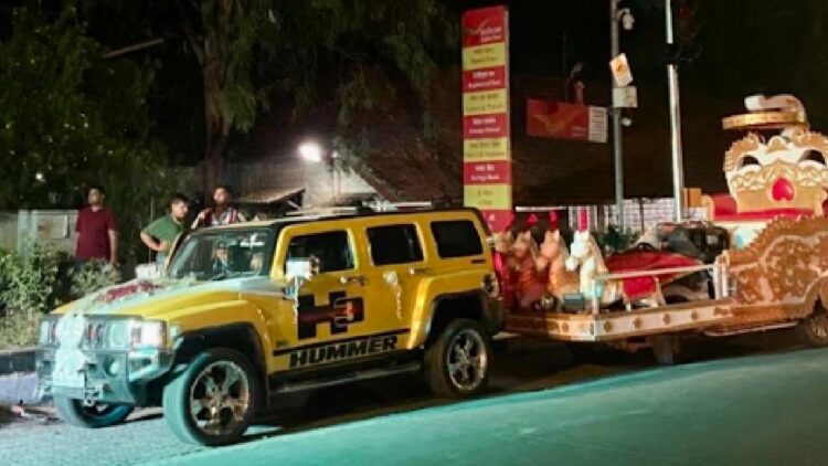 Hummer Pulling Marriage Stage on Road in India