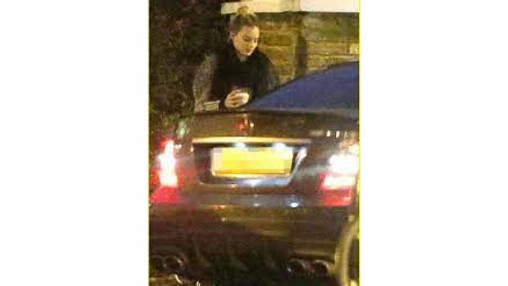Margot Robbie with her Mercedes