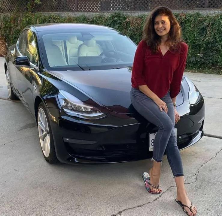 Pooja Batra with her Tesla Model 3
