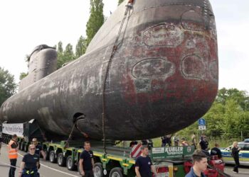 4 Trucks Pull Submarine in Germany
