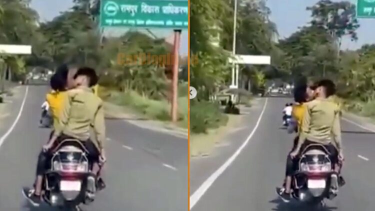 Two Boys Kissing on Moving Scooty