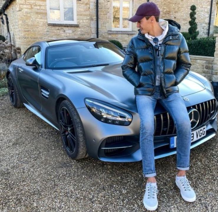 George Russell with his Mercedes AMG GT