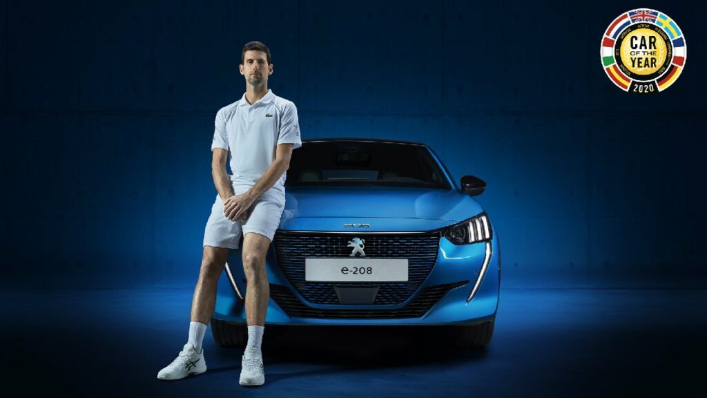 Novak Djokovic with his Peugeot e-208