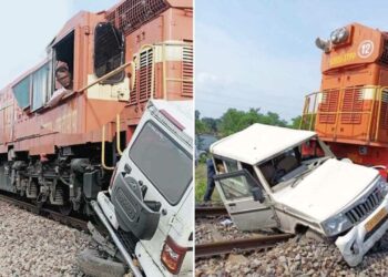 Mahindra Bolero Hit by Train at Crossing