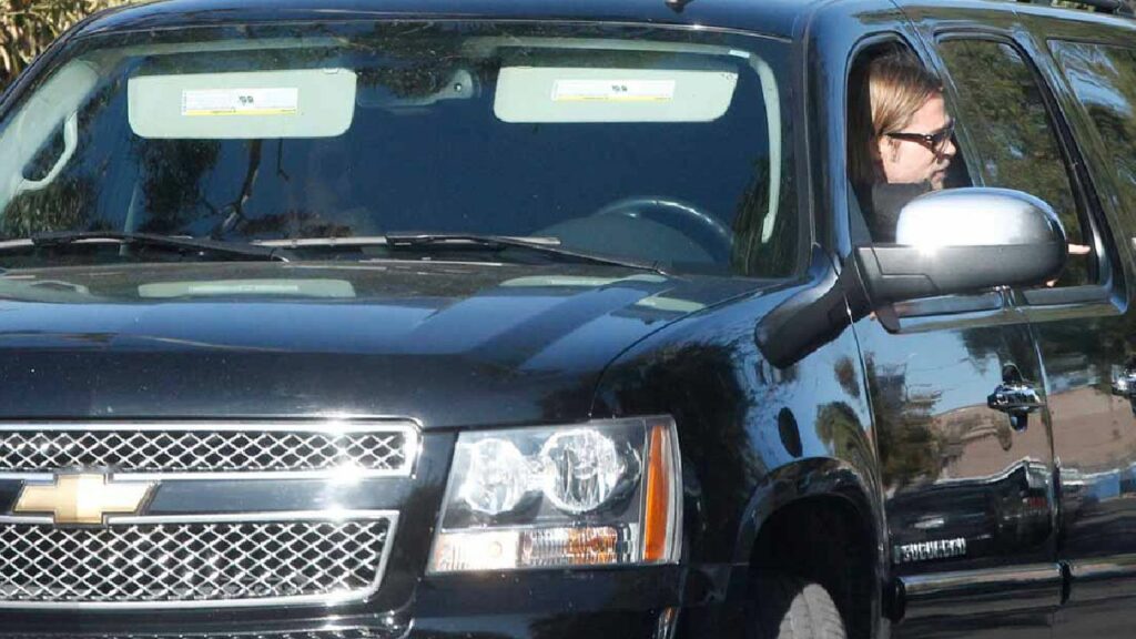 Brad Pitt in Chevrolet Tahoe