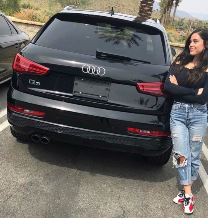 Jenna Ortega with Audi Q3