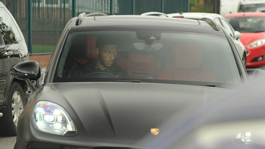 Joe Gomez in His Porsche Cayenne