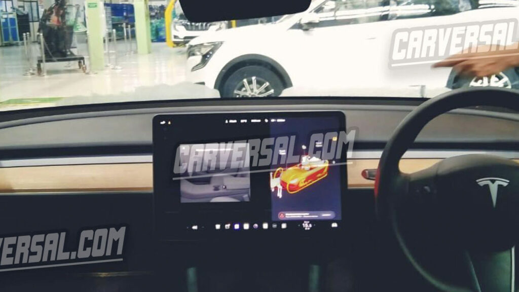 Tesla model y interior mahindra xuv700
