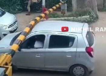 Maruti Alto Driver Breaks Railway Barrier at Crossing