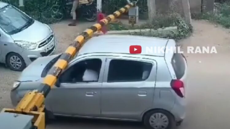 Maruti Alto Driver Breaks Railway Barrier at Crossing