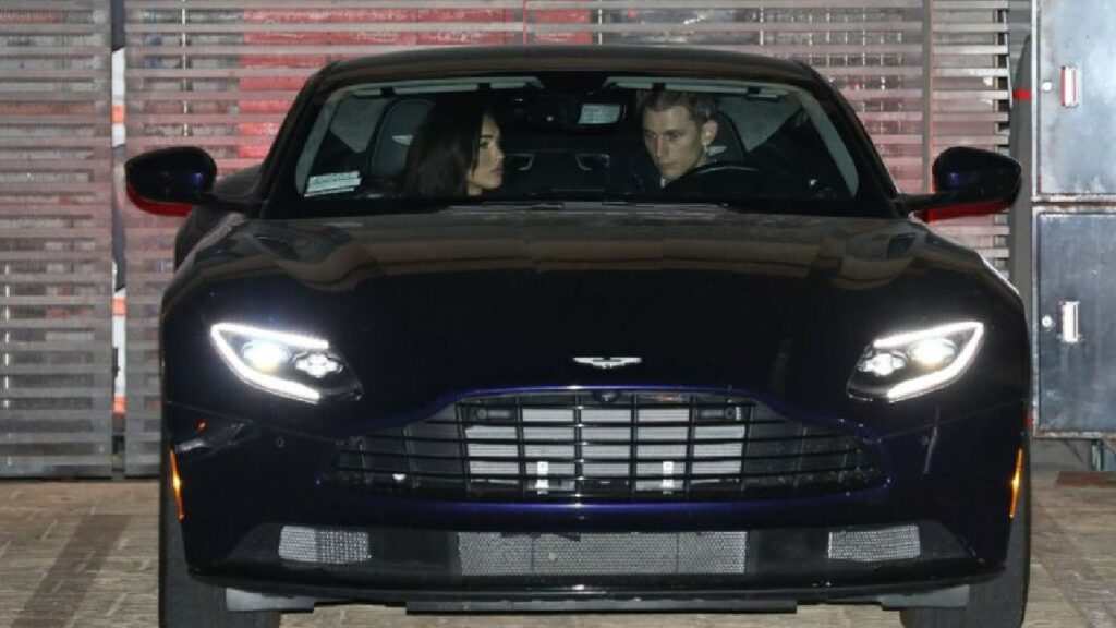 Megan Fox in her Aston Martin DB11