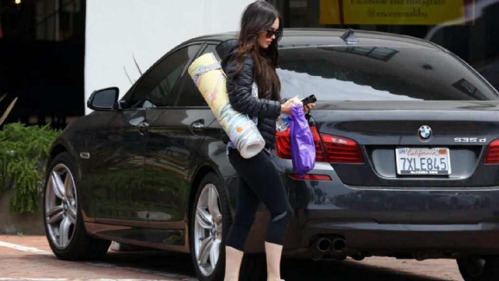 Megan Fox in her BMW 5 Series