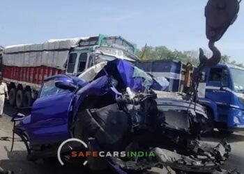 Mahindra XUV7000 Crushed Between Two Trucks
