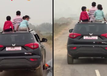 3 Children Standing out of Sunroof of Mahindra XUV300