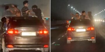 Youngsters Hang Out of Sunroof and Windows of Honda City