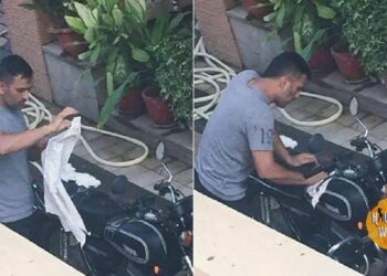 MS Dhoni Seen Wiping Yamaha RD350