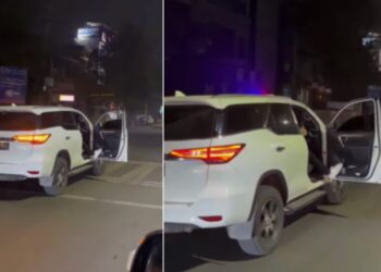 Toyota Fortuner Driven with Open Door