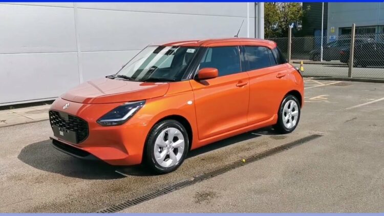 New Maruti Swift Motion Orange Paint