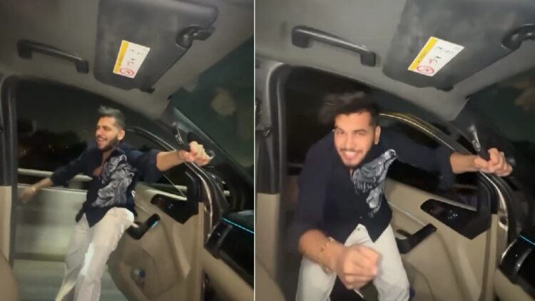 Man Hanging Out of Ford Endeavour