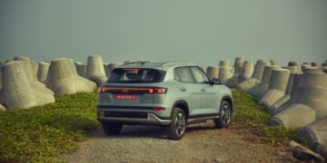 Hyundai Creta Electric Review Images Rear Three Quarters Grey Colour