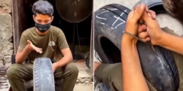 Roadside Worker Carving Grooves on a Worn-Out Tyre to Make it New