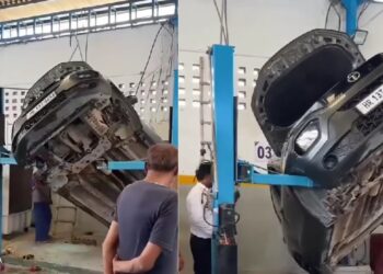 Tata Punch Hanging from Forklift at Workshop